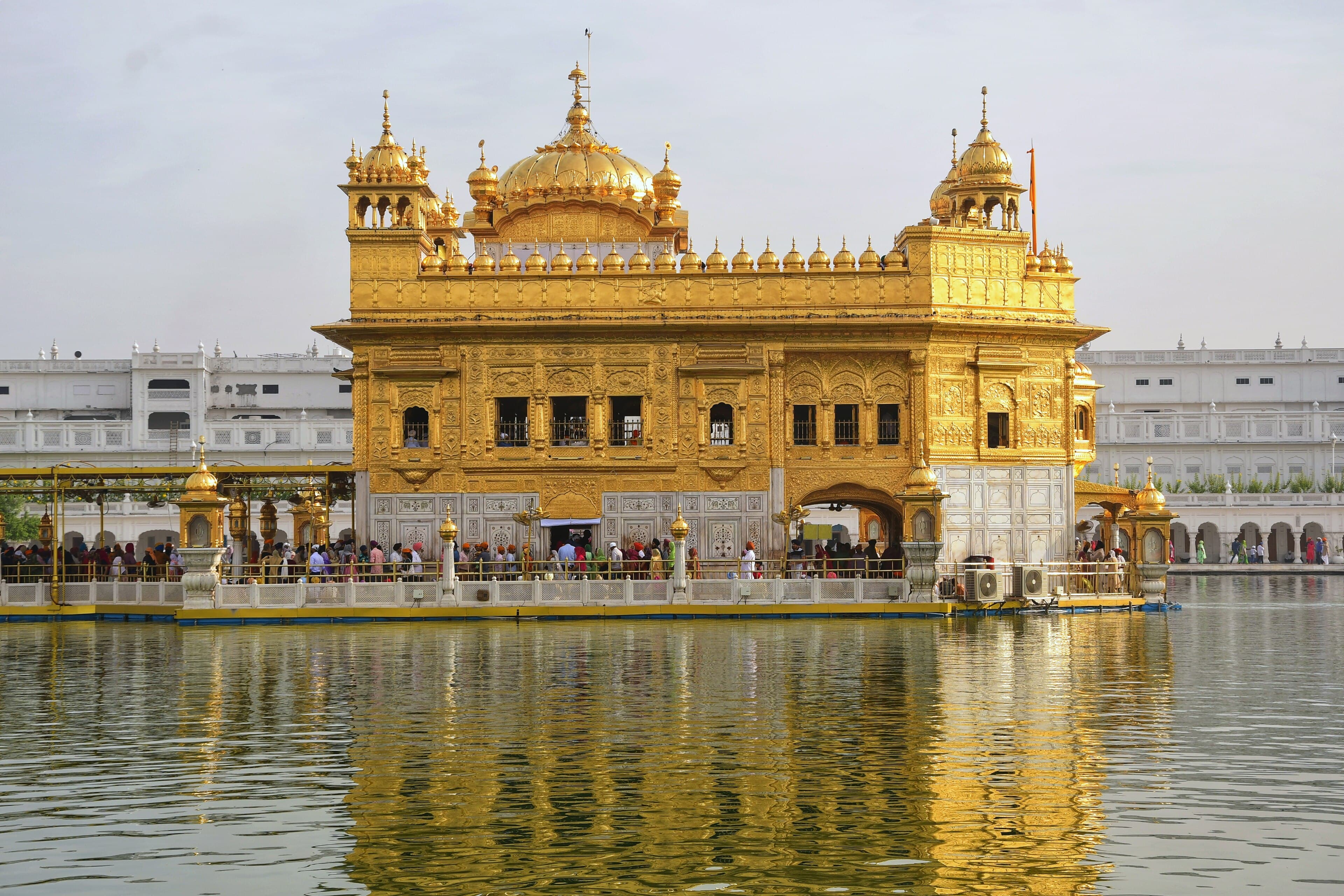 Pilgrims beside the sacred pool at the Golden Temple